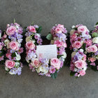 Open lettering funeral tribute