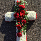 Cross funeral tributes