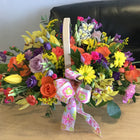 Rainbow colurs basket created in a variety of seasonal flowers , florist choice. Size in picture is medium 