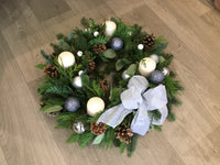 Christmas wreath ring , with candles, for a table arrangement
