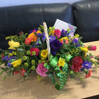 Seasonal basket of flowers in large trug