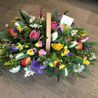 Seasonal basket of flowers in large trug